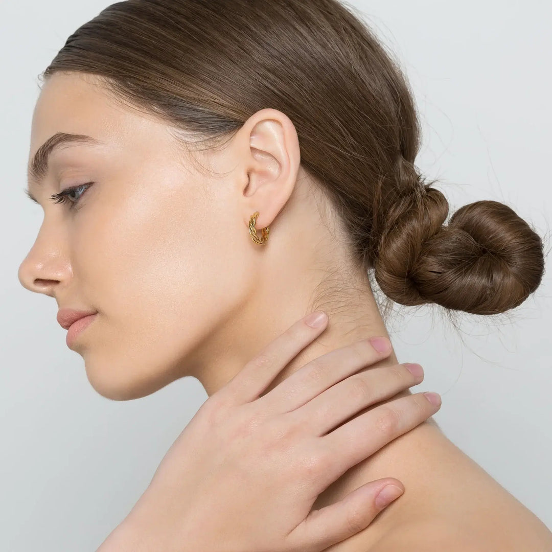 Huggie hoop earrings made of twisted wire